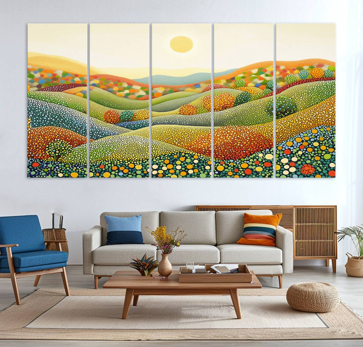 The YAYOI KUSAMA Colorful Dot Art Landscape Canvas, a framed abstract pointillism piece inspired by nature featuring vibrant rolling hills and a sun, adds gallery-quality elegance to your living space.