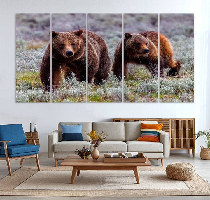 The "Queen of the Tetons" is a stunning canvas art print featuring Grizzly 399 and two bears strolling through a grassy field. Its gallery-quality finish beautifully captures the essence of nature, making it perfect for rustic home decor.