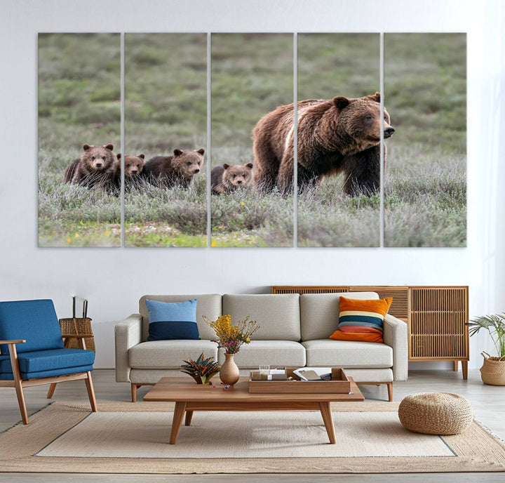 The large canvas print titled "Queen of the Tetons, 399 Grizzly Bear Cubs" showcases majestic wildlife photography of a bear and her cubs walking through the grass. This stunning canvas wall art, handmade in the USA, adds a charming touch to any room with its rustic decor appeal.