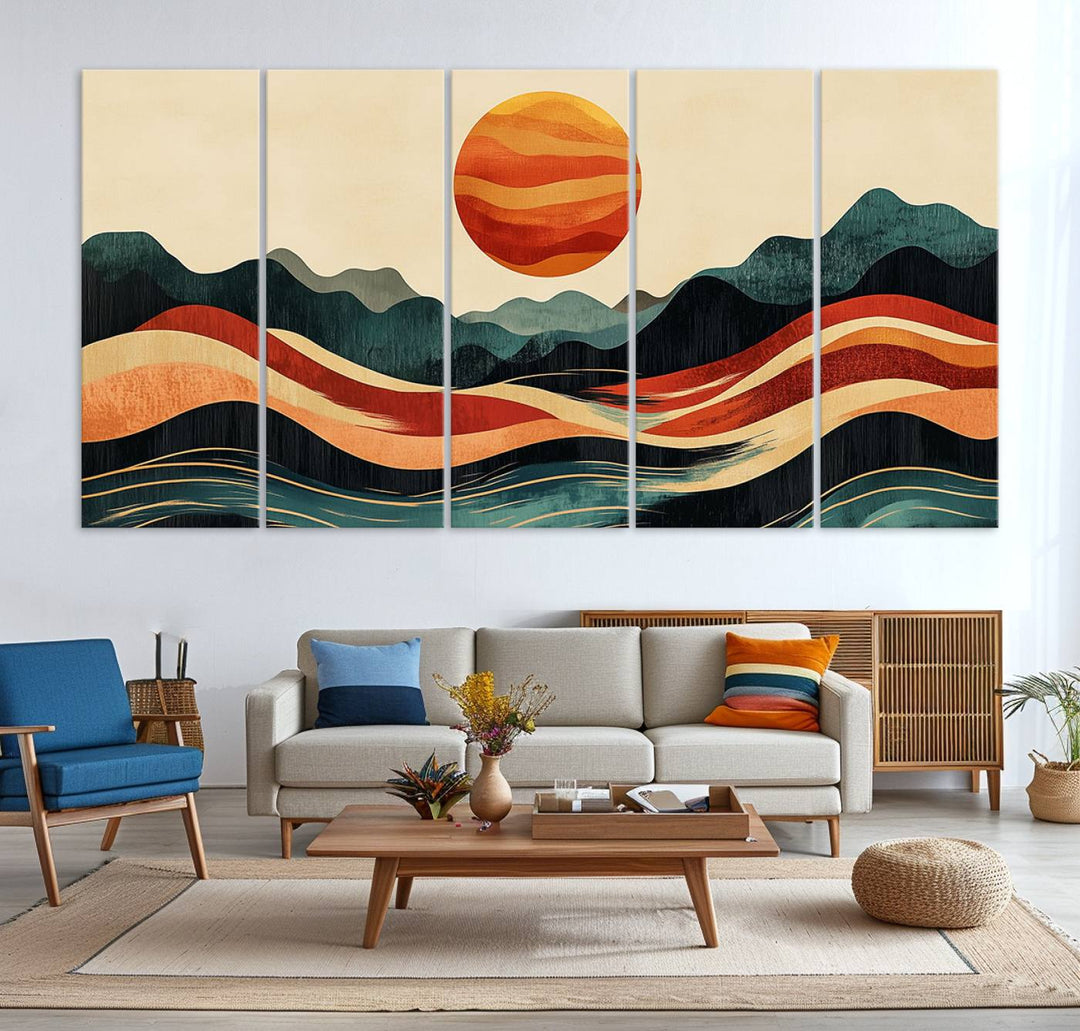 The Mountain Triptych wall art, featuring a design of the sun, mountains, and waves, is displayed prominently on the wall.