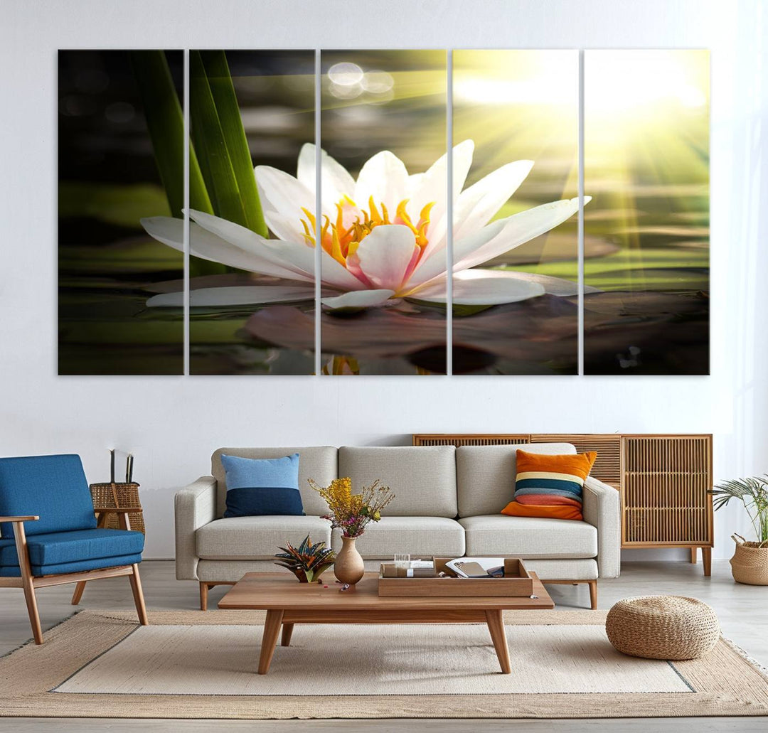 The Lotus Flower Wall Art Canvas Print showcases a white water lily with a yellow center floating gracefully in sunlight.