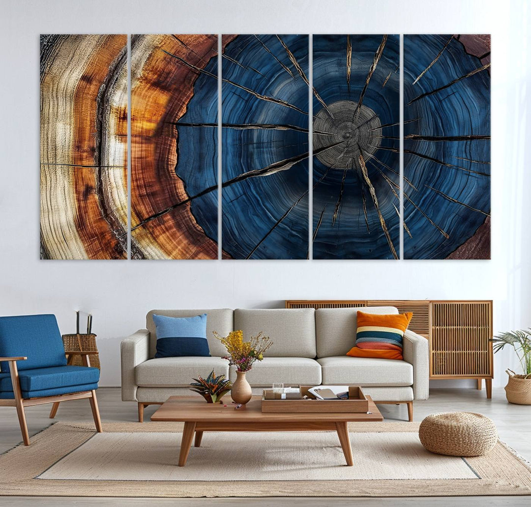 The Abstract Tree Rings Canvas Print features blue, brown, and orange rings that highlight wood grain and natures beauty.