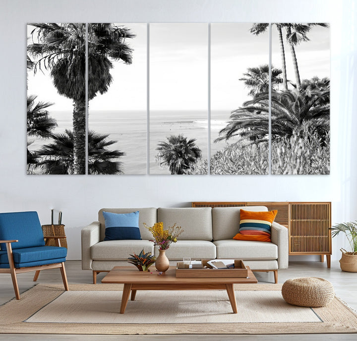 Monochrome canvas of palm trees framing a coastal surf scene, perfect for California-inspired or retro black-and-white beach decor.