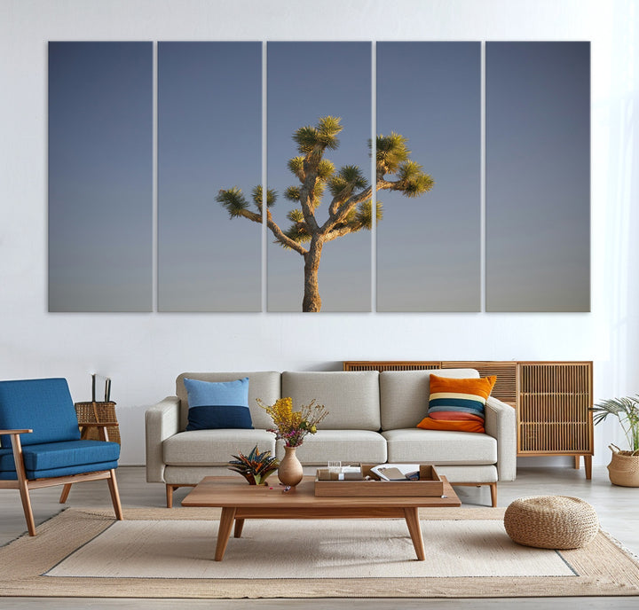 A lone Joshua Tree standing against a deep blue sky, capturing the serene and rugged beauty of the Southwestern desert landscape.