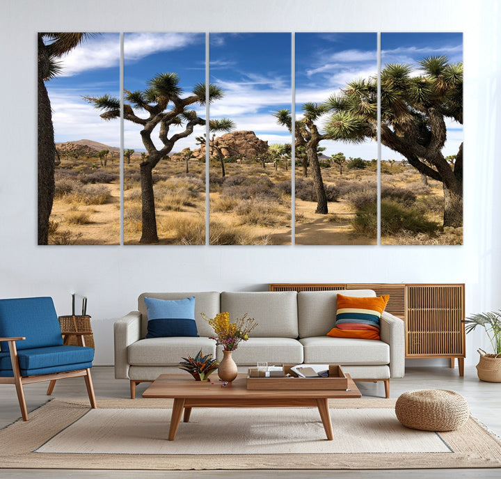 Scenic Joshua Tree landscape with rugged desert terrain, golden dry grass, and a deep blue sky, creating a warm, rustic Southwestern aesthetic.
