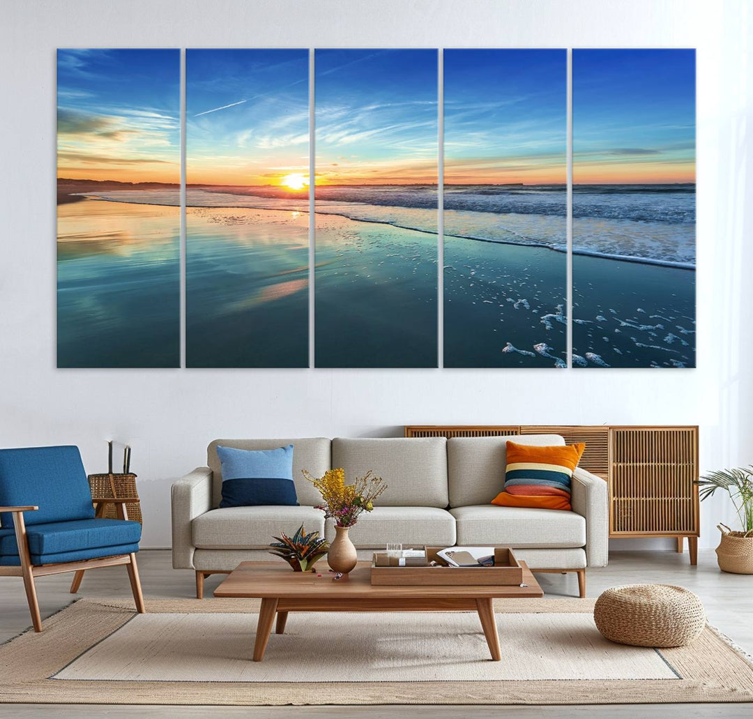 The Blue Sky and Beach Wall Art Canvas Print features a vibrant orange sky reflecting on wet sand.