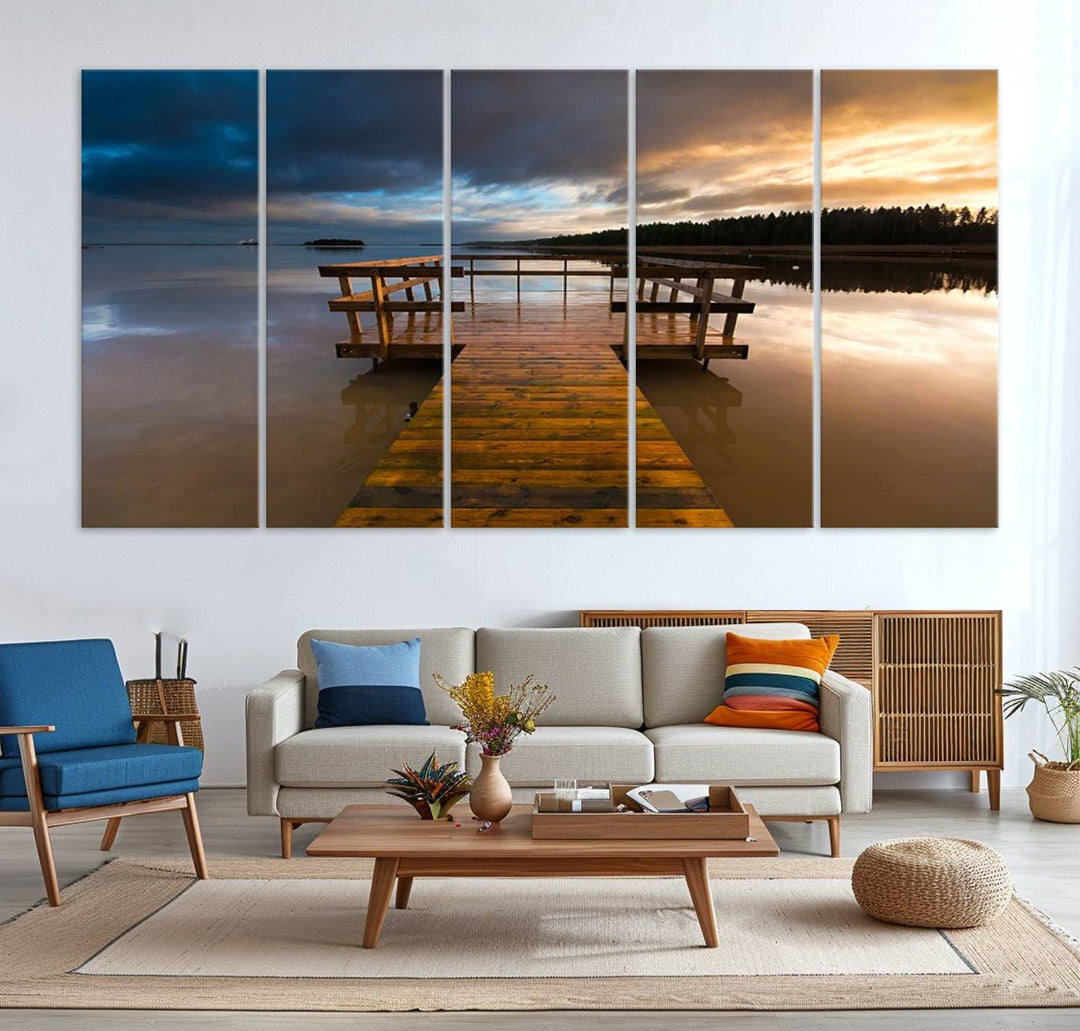 The "Serene Lake Pier at Sunset" landscape canvas print, crafted as ready-to-hang and framed wall art, enriches the contemporary setting by capturing the tranquility of a lakeside pier at sunset.