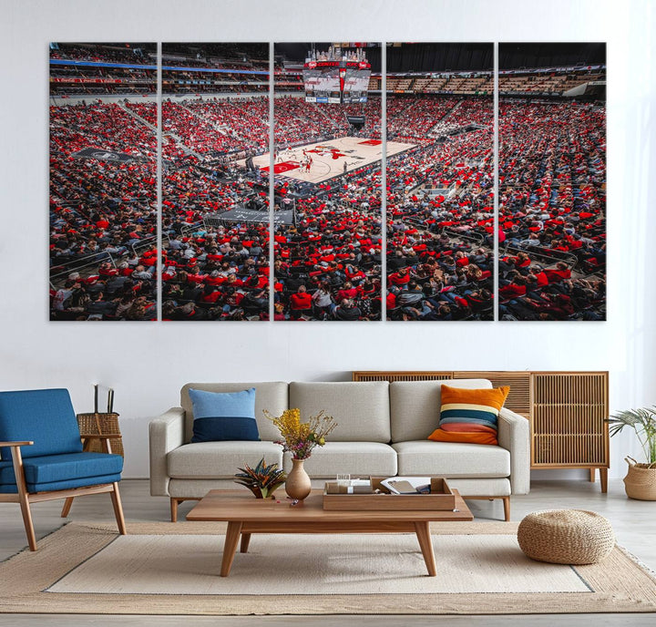 A painting of Louisville Cardinals fans in red at the KFC Yum Center Arena.