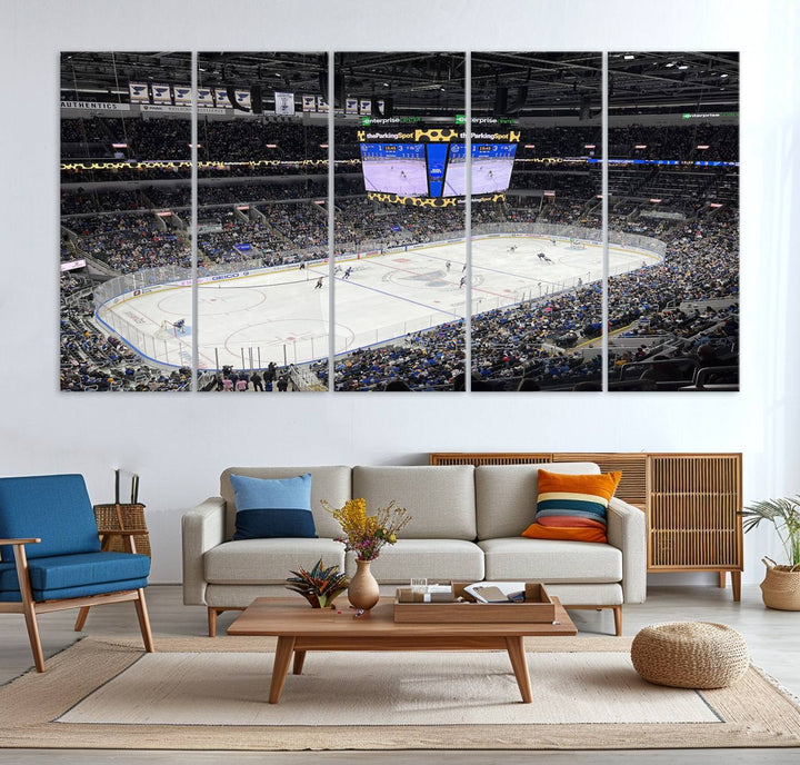 A large Enterprise Center canvas of a crowded hockey arena hangs prominently.