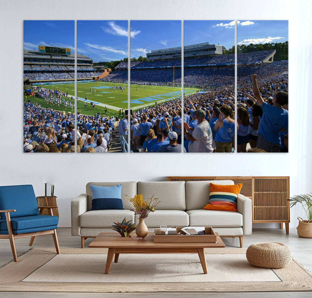 A gallery-quality canvas wall art print featuring the University of North Carolina Tar Heels Football Team and Chapel Hill's Kenan Memorial Stadium adorns the cafe wall.