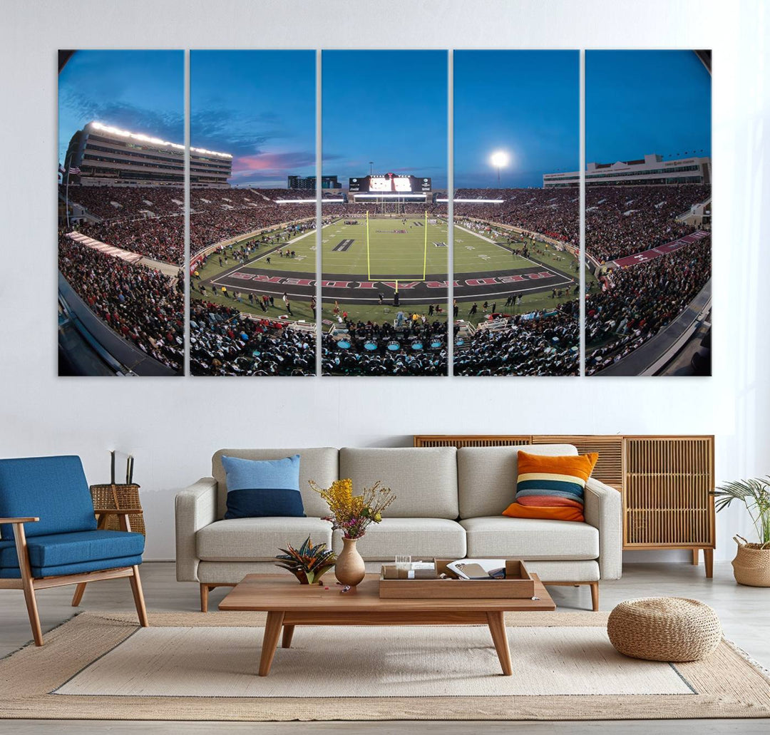 The wall art in the living room features a Texas Tech Red Raiders Football Team Print, showcasing Jones AT&T Stadium at dusk.