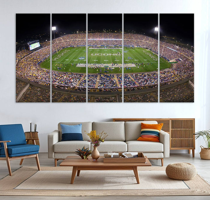 A large football stadium at night, featuring the UCONN Huskies, is depicted on the East Hartford Pratt & Whitney Stadium Wall Art Canvas Print.