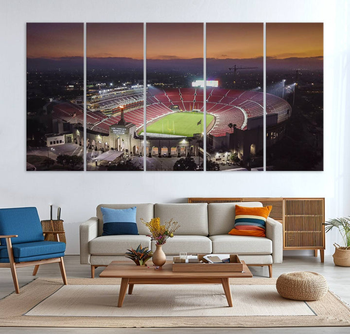 The USC Trojans Stadium canvas captures Memorial Coliseum at twilight, showcasing red seats and a green field beneath an orange sky.