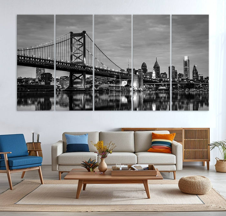 The "Large Wall Art Philadelphia Canvas Print" showcases a black-and-white depiction of the Ben Franklin Bridge with a water reflection.