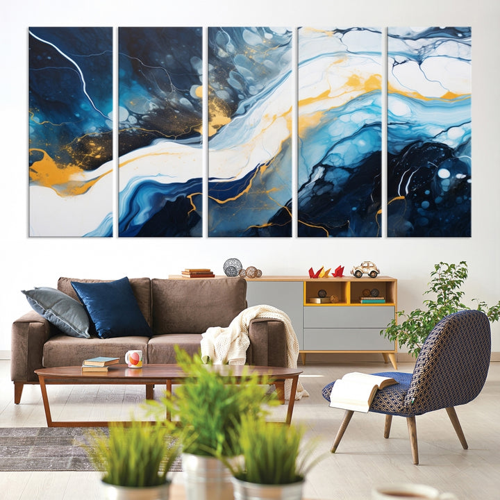 The Navy Blue Abstract Wall Art Canvas Print, displaying an exquisite array of blue, white, and gold swirls, is crafted on museum-quality canvas and enhances the space with its sophisticated elegance.