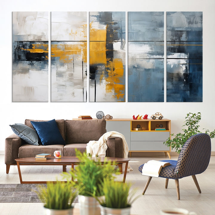 The Orange Abstract Wall Art Print features a series of white, blue, black, and yellow blocks arranged in a triptych format on museum-quality canvases. Proudly made in the USA and offered with free shipping.