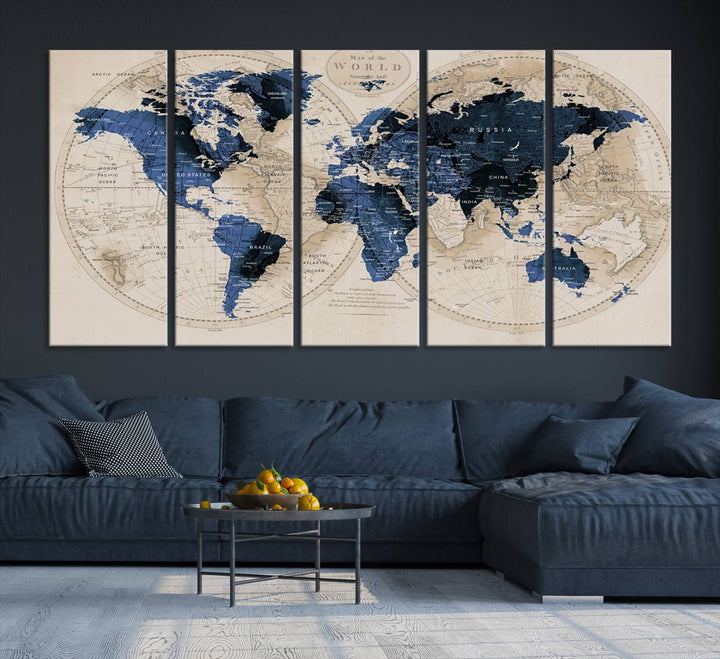 The Vintage Triptych Map Print is a grunge-stained blue and beige world map, perfect for enhancing wall decor.