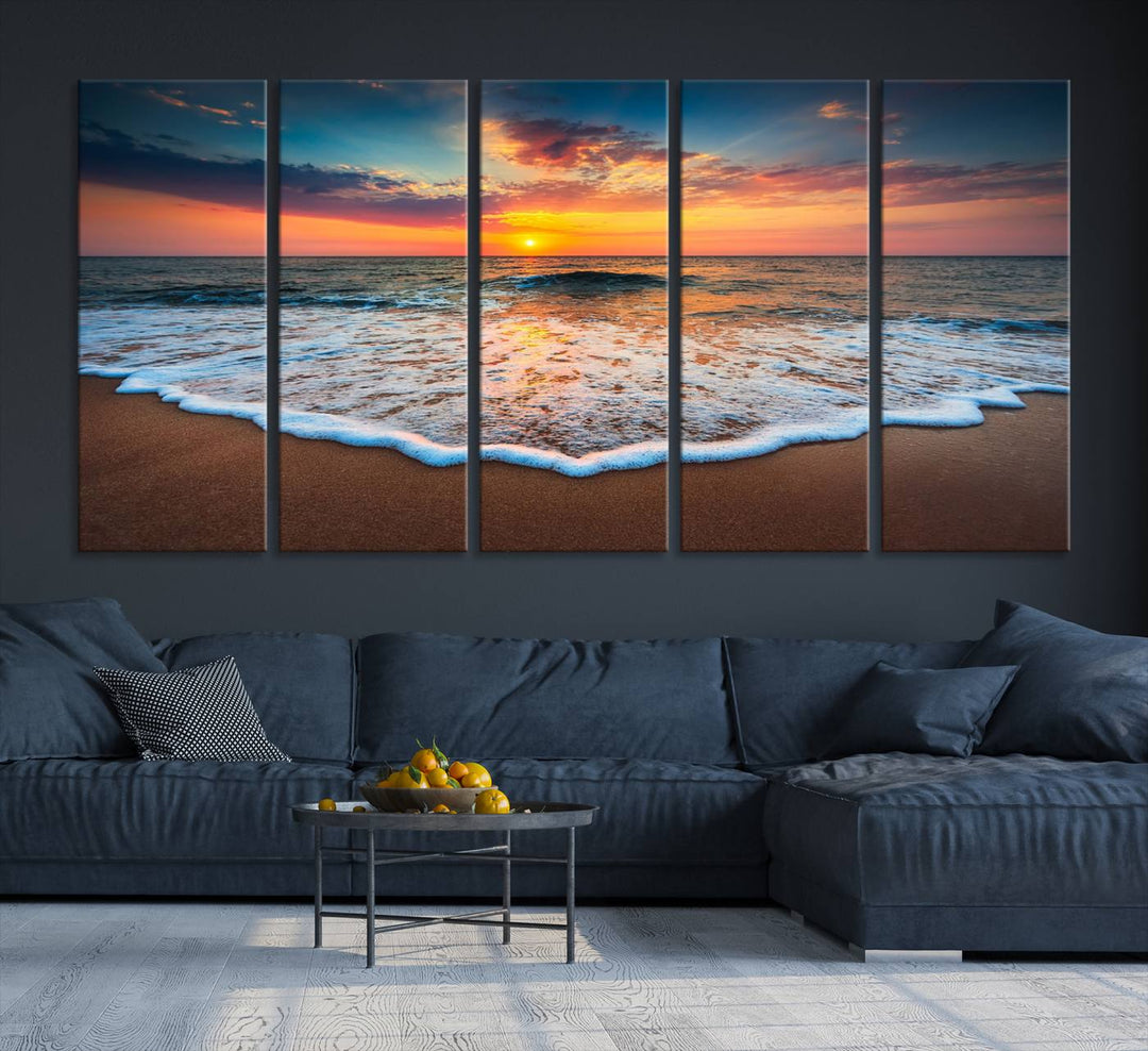 A Sunset with Calm Waves on the Beach Wall Art Canvas Print adorns the dining room.