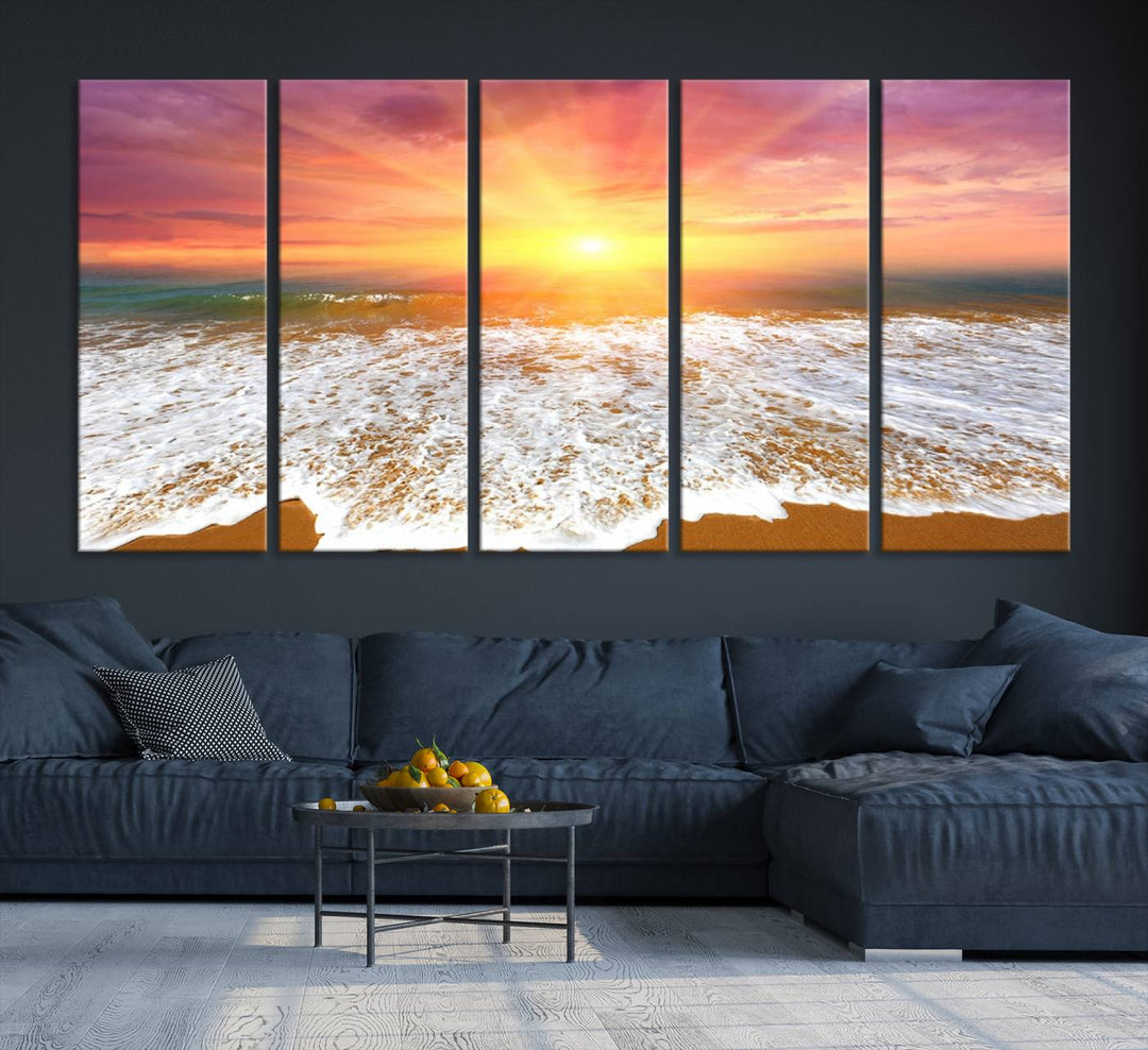 Golden Beach Sunrise 3-panel canvas art of ocean waves, hung on a wooden wall.