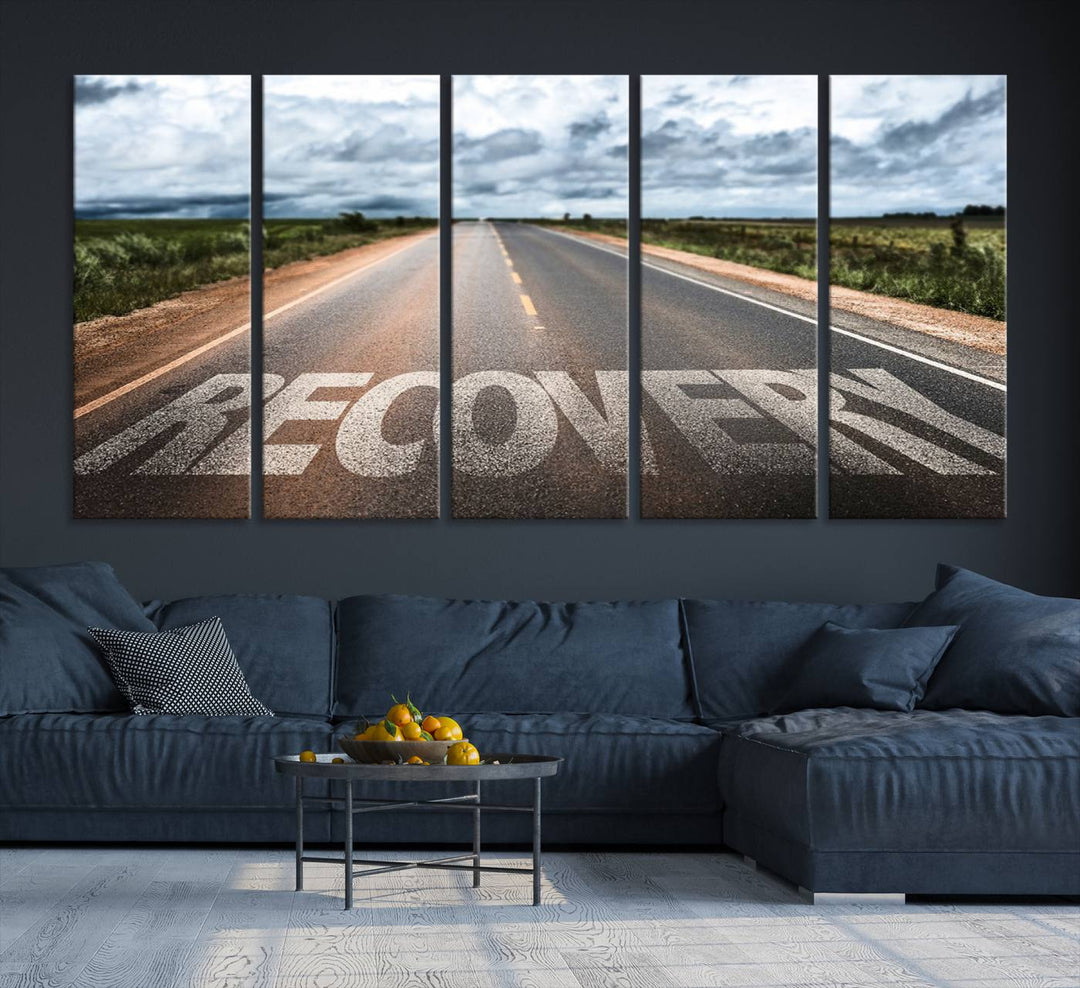 The Recovery Road Wall Art Canvas Print depicts a road under a cloudy horizon.