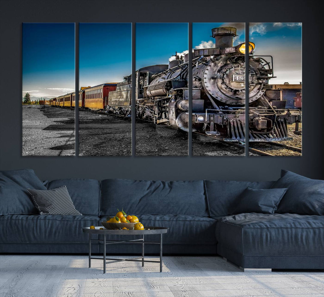 The Train Wall Art Canvas Print features a vintage steam train with a bright headlight.