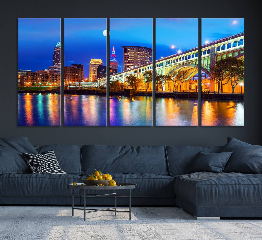 A Cleveland Night Skyline Wall Art on museum-quality canvas showcases a bridge and illuminated buildings.