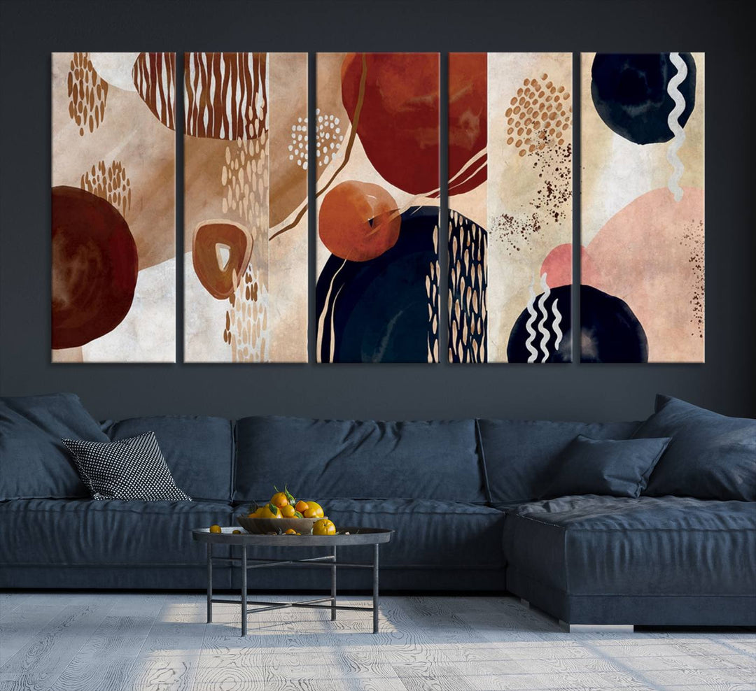 The Boho Neutral Canvas Print Set with earthy tones and circles hangs on the wall.