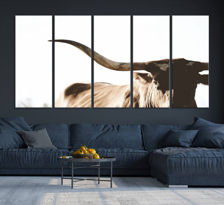 A 3-panel Texas Longhorn canvas adds a touch of rustic Western decor.