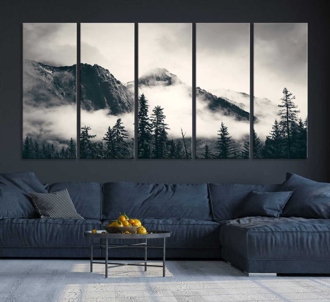 A large foggy mountain forest canvas print hangs prominently in the room.