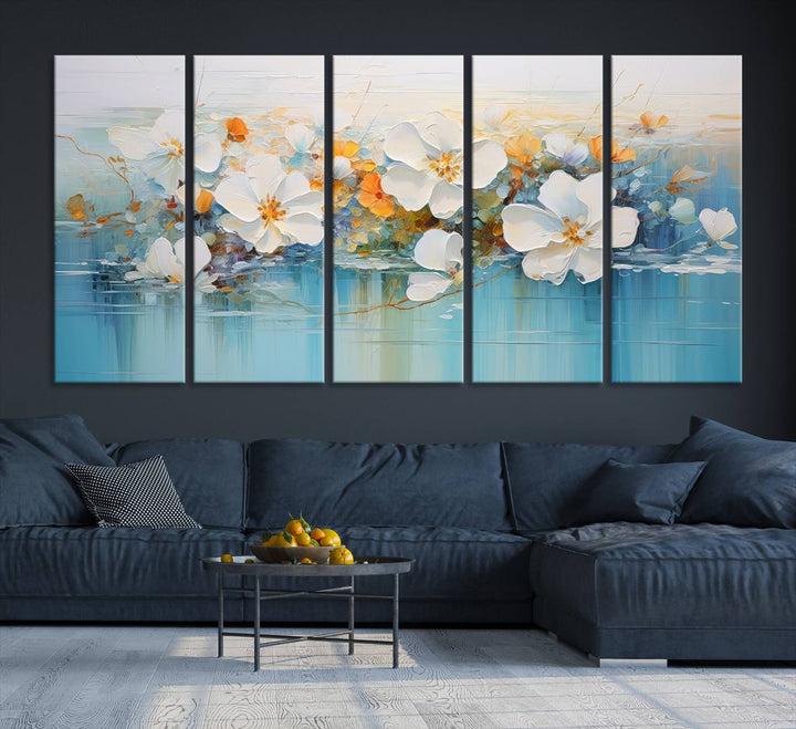 An Abstract Flower Wall Art Canvas Print in blue and orange hues.