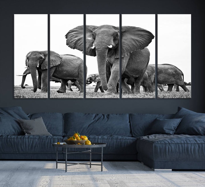 A modern dining area features a Black White Elephant Family Wall Art Canvas Print.