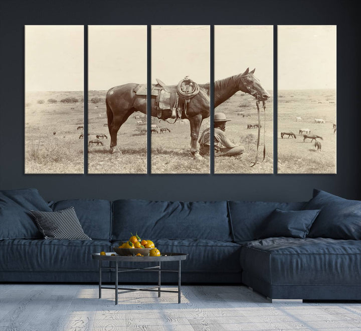 Cowboy Wall Art - Vintage Western Horse Canvas Print features a cowboy kneeling by his horse in a field.