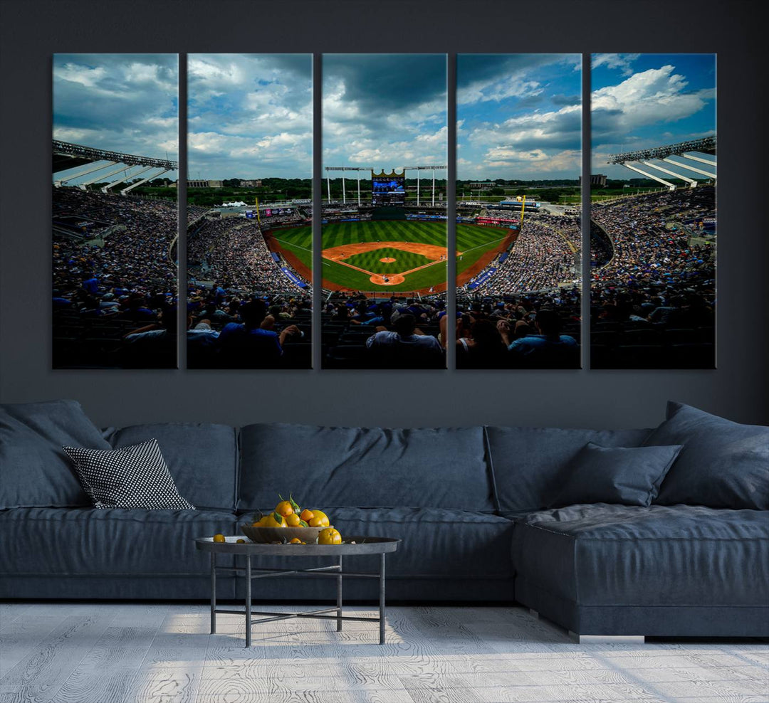 A 3-panel print of Kauffman Stadium, showcasing a crowded baseball field under cloudy skies.