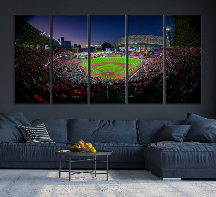 A canvas print of Houston Minute Maid Park at dusk is mounted on the wall.