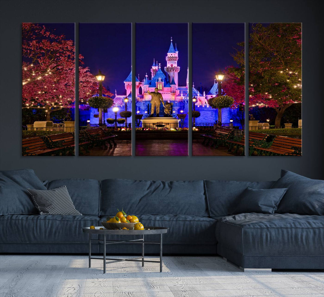 The Castle Large Wall Art is surrounded by illuminated trees at night.