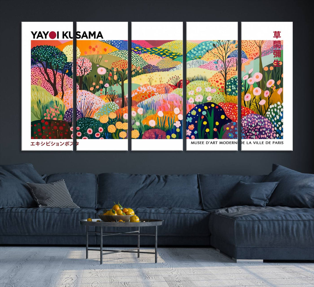 Three vibrant, abstract Yayoi Kusama wall art prints adorn a black wall, creating a perfect blend of contemporary décor.