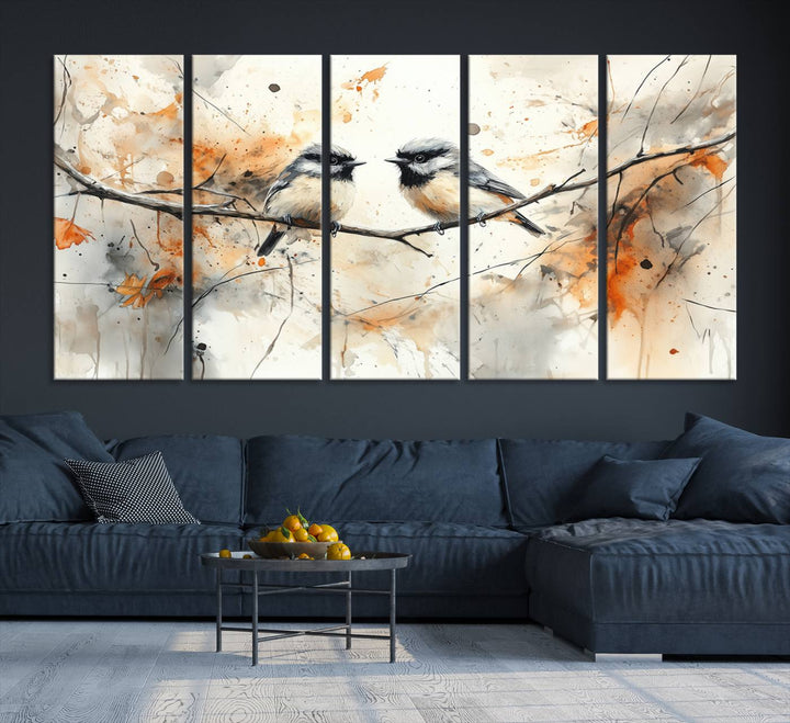 The living room features abstract watercolor chickadee bird art on the wall.