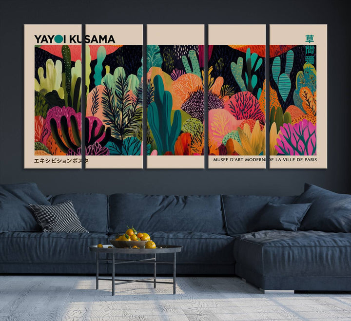 The vibrant canvas print of wall art features abstract plants, with the elegant text "Yayoi Kusama Wall Art Canvas Print" displayed on the colorful frame.