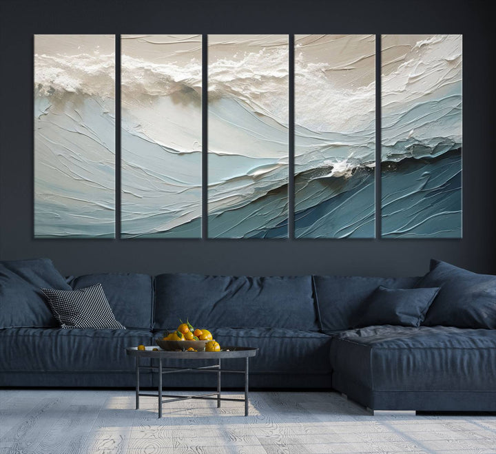 The Waves Abstract Wall Art Print, a captivating piece of modern framed abstract canvas, beautifully decorates the wall. This abstract painting is designed to enhance your living room decor and offers the convenience of being ready to hang.