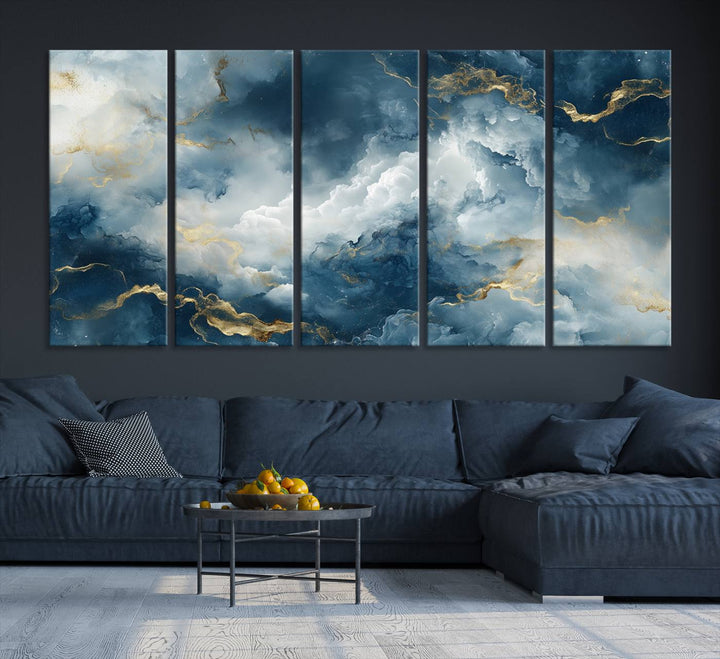 The "Large Abstract Print - Luxe Blue and Gold Abstract Canvas Wall Art" features a bold cloudscape design with swirling white patterns, ideal for modern home decor in living rooms or offices.