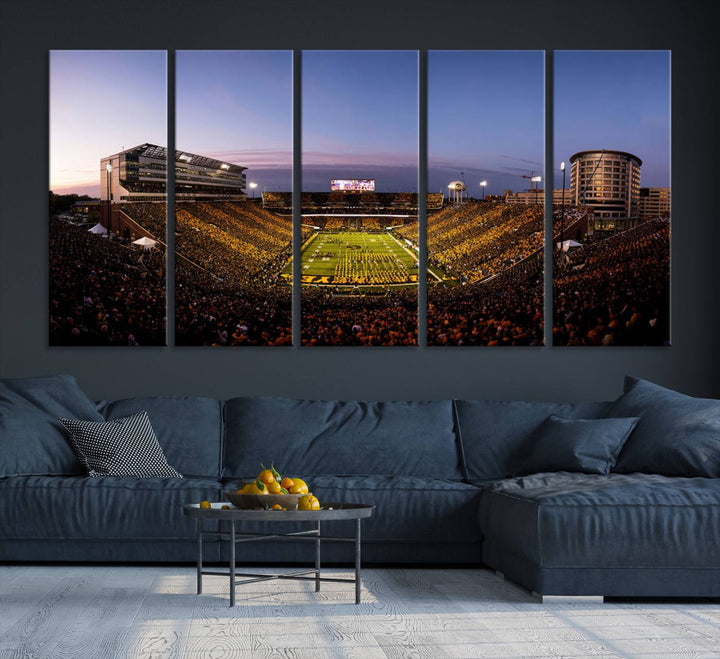 The Iowa Hawkeyes Kinnick Stadium Wall Art Canvas Print captures a sunset scene, making it perfect for display on a wall.