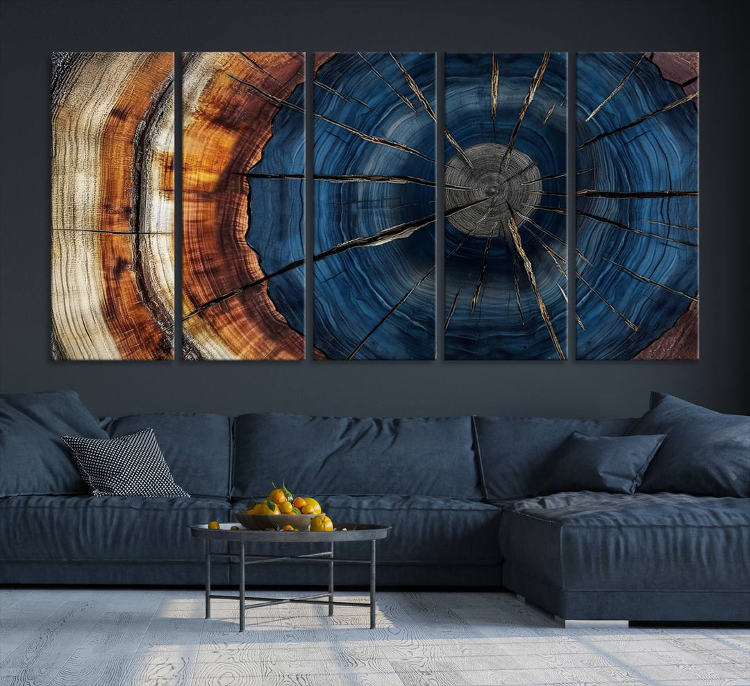 The Abstract Tree Rings Canvas Print features blue, brown, and orange rings that highlight wood grain and natures beauty.