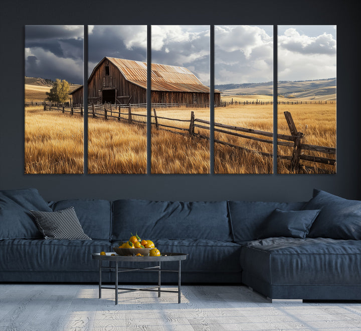 Canvas of a weathered wooden barn in a golden field under a dramatic sky, perfect for rustic or farmhouse-style wall decor.