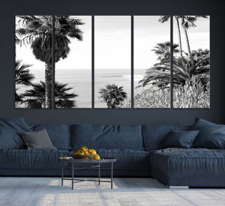 Monochrome canvas of palm trees framing a coastal surf scene, perfect for California-inspired or retro black-and-white beach decor.
