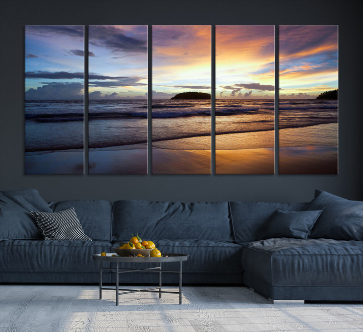 A tropical beach at sunset with waves gently washing ashore, reflecting golden and purple hues in the sky, creating a tranquil coastal scene.