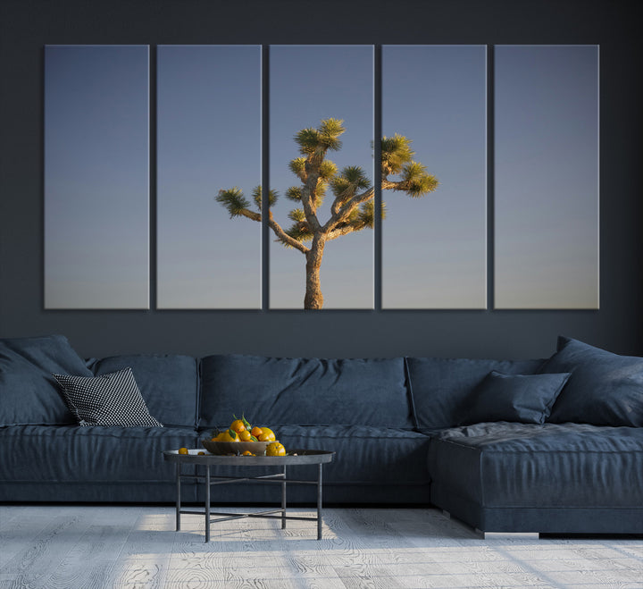 A lone Joshua Tree standing against a deep blue sky, capturing the serene and rugged beauty of the Southwestern desert landscape.