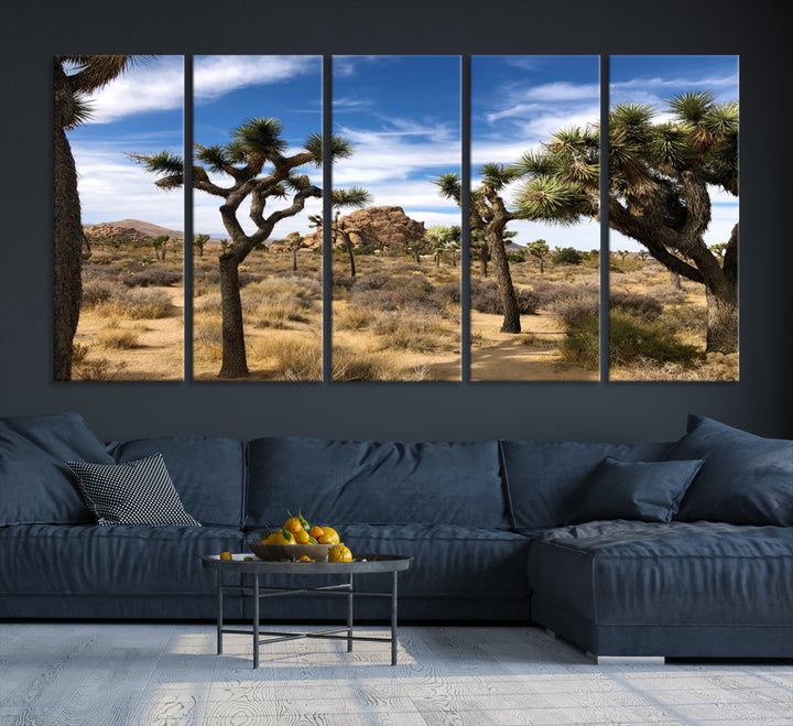 Scenic Joshua Tree landscape with rugged desert terrain, golden dry grass, and a deep blue sky, creating a warm, rustic Southwestern aesthetic.