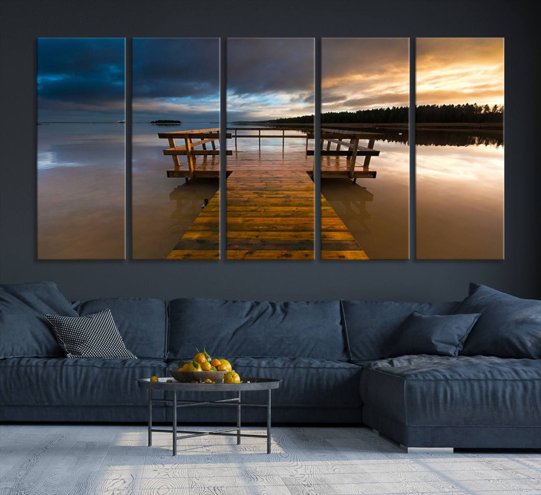 The "Serene Lake Pier at Sunset" landscape canvas print, crafted as ready-to-hang and framed wall art, enriches the contemporary setting by capturing the tranquility of a lakeside pier at sunset.