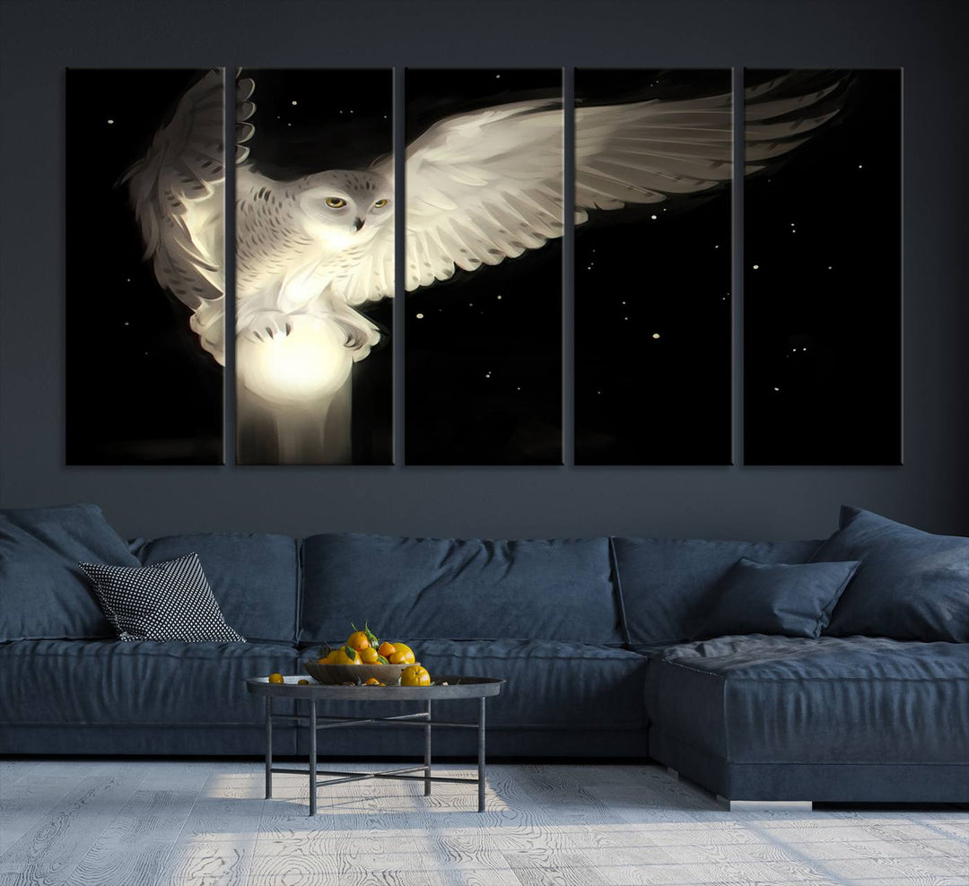 The Night Owl Art graces the wall with its depiction of a snowy owl on a glowing orb, perfect for modern decor.