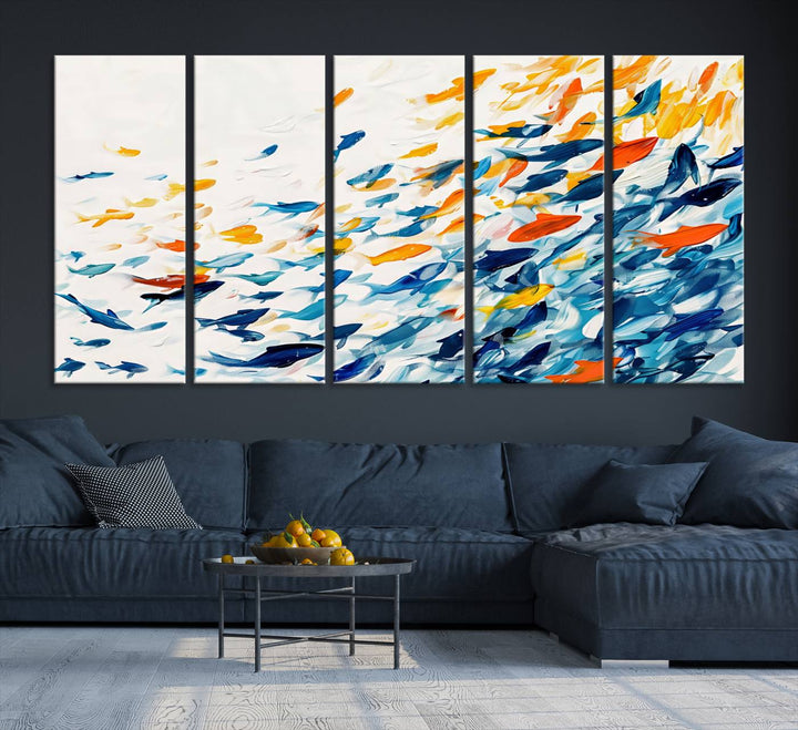 A colorful Abstract Fish Shoal Canvas Print hangs on the wall.